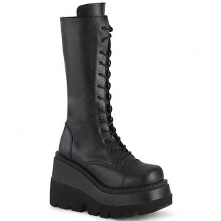 Bottes mixtes coloris noir talon compensé