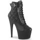 Bottines noires à talon haut et plateforme Lady Gaga.