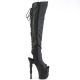 Bottes gothiques cuissardes noires à talons hauts 20cm et plateformes 10cm, motifs tête d