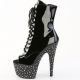 Chaussures plateforme noires vernies talon très haut Pleaser.