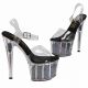 Chaussures de soirée transparentes talon noir pailleté.