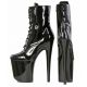 Chaussures érotiques noires vernies plateforme haut talon.